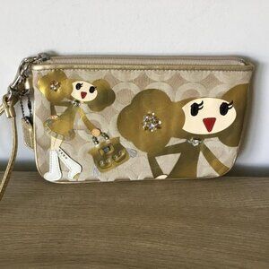 Coach Poppy Chan Goldy Wristlet in the Special Edition Poppy Chan Collection